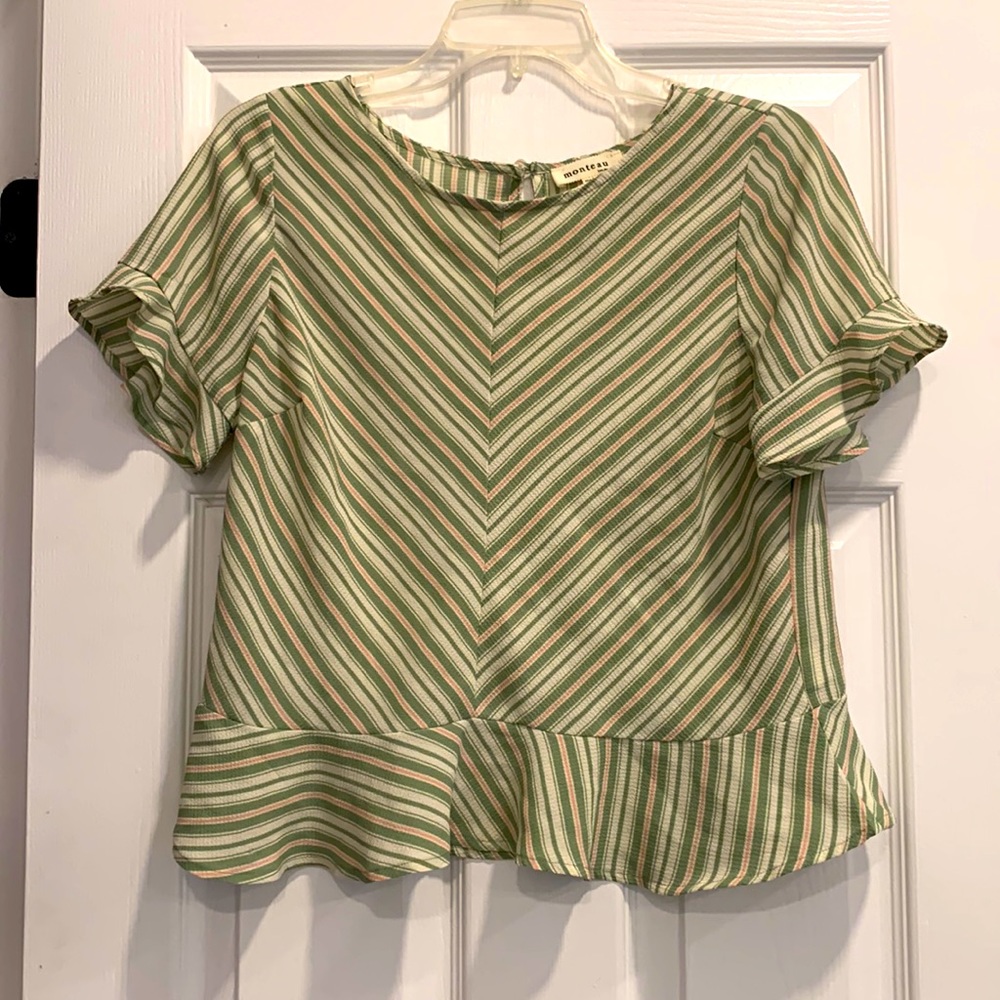 Crop top blouse with ruffled sleeves and bottom.